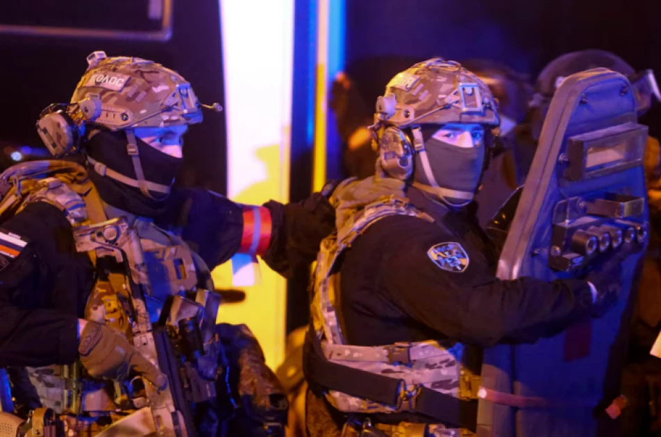 Russia arrests suspected gunmen as concert toll rises to 93