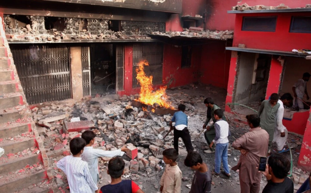 Italian artist injured in 'blasphemy' protest in church