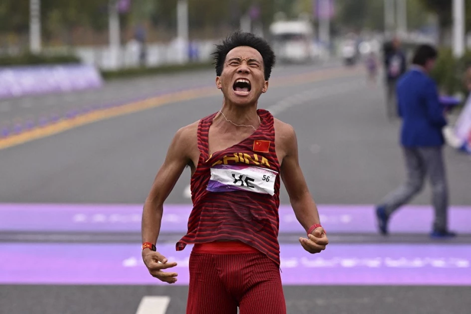 Chinese He Jie's win in Beijing Half Marathon revoked after probe Chinese He Jie's win in Beijing Half Marathon revoked after probe