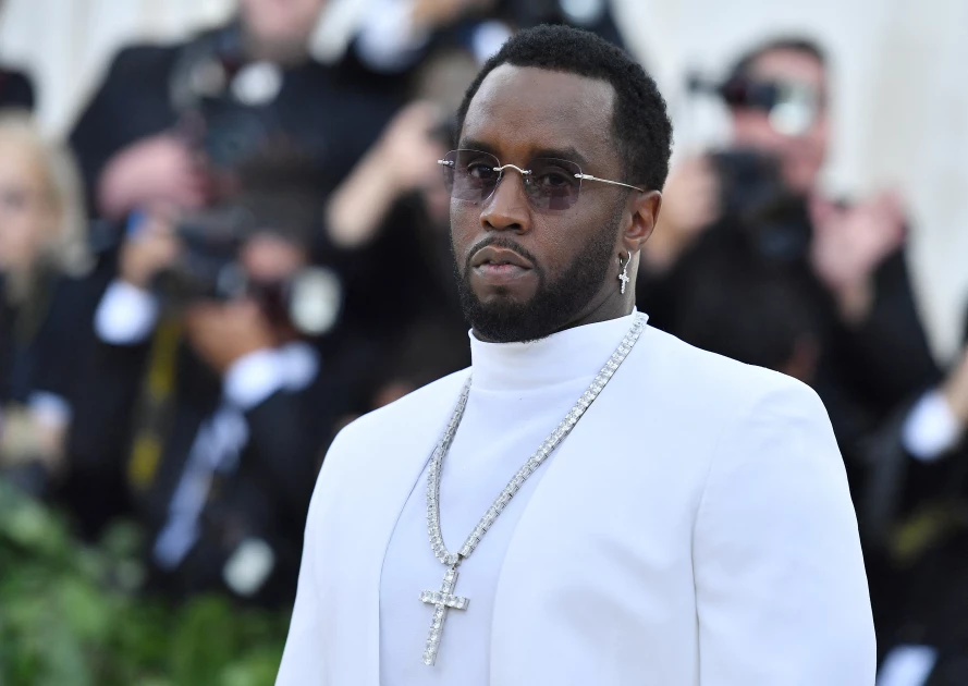 Sean 'Diddy' Combs apologizes after video shows him assaulting partner