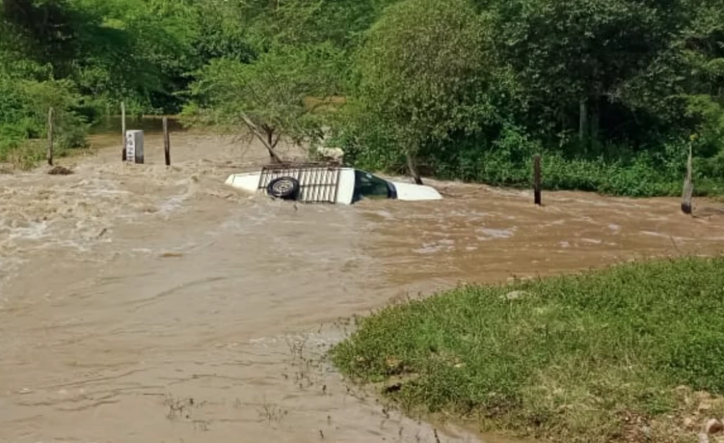Two people rescued after car swept by floods in Narok