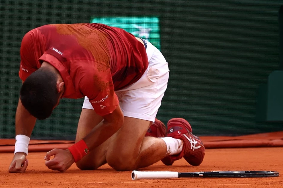'Really sad' Djokovic out of French Open with knee injury