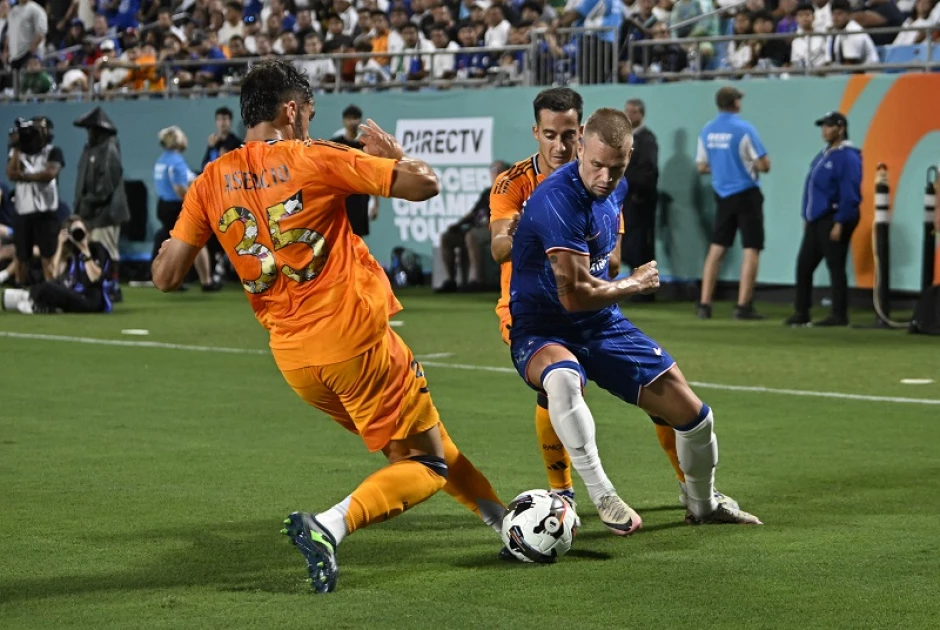 Real Madrid edges Chelsea while AC Milan wins on penalties