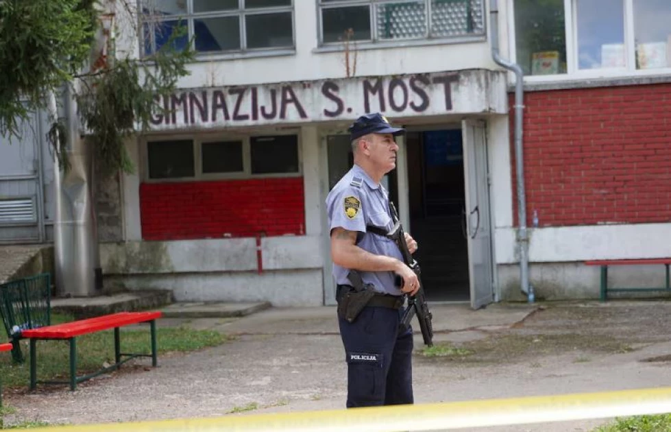 Three staff killed in shooting in school in Bosnia