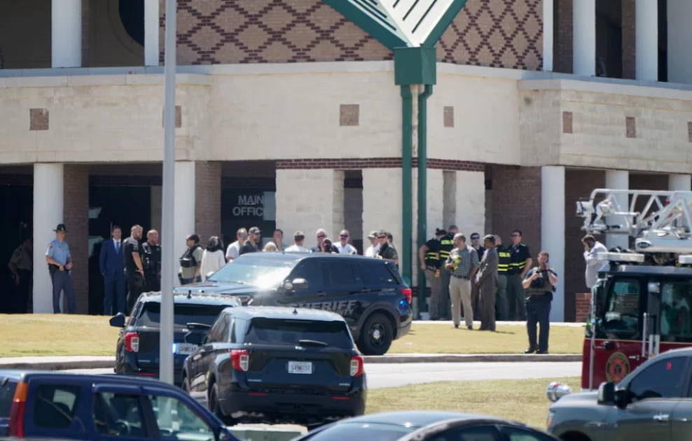 Georgia high school student, 14, kills 4 and wounds 9 in campus shooting