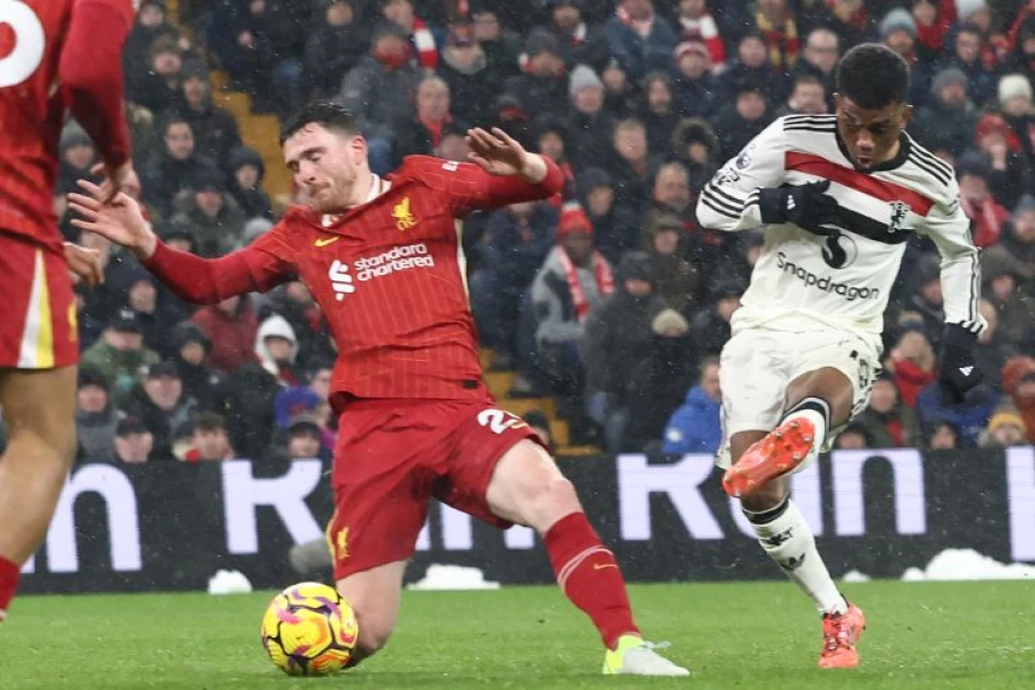 Man United hold Liverpool at Anfield, slow their title charge