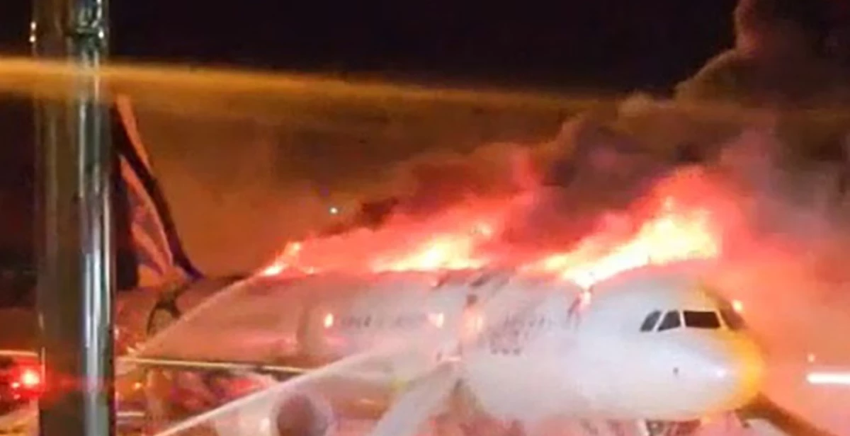 Passenger plane catches fire at S. Korean airport, 176 people evacuated