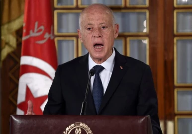 Tunisia leader's opponents, supporters stage rival rallies in sharp political split