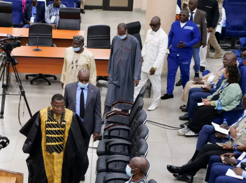 Guinea junta chief pardons former military leader over stadium massacre