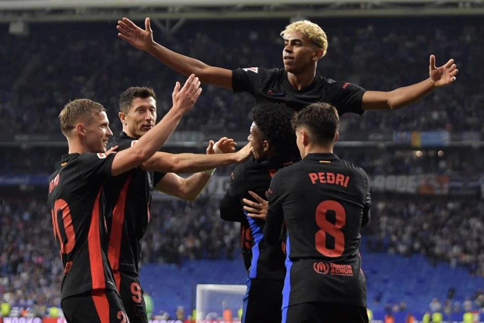 Barca ease to Getafe win, Atletico held after missed penalty Barca ease to Getafe win, Atletico held after missed penalty
