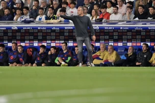 Flick extends Barcelona deal to 2027 after title triumph