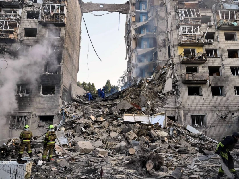 Russian strikes kill 10 in 'horrific' attack on Kyiv