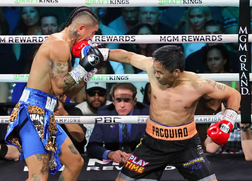 Pacquiao held to draw by Barrios in world title return