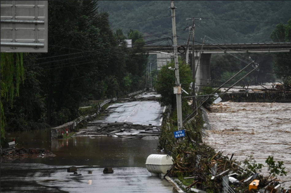 Four killed as heavy rain, flooding soaks northern China