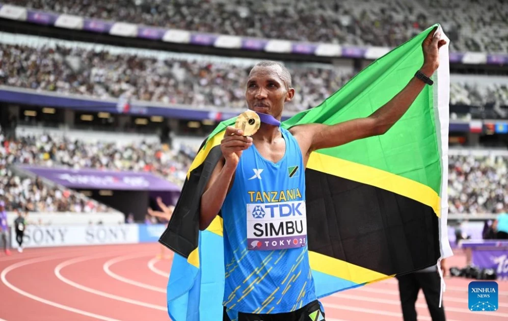 First-ever Tanzanian gold as Simbu dips past Petros in world marathon