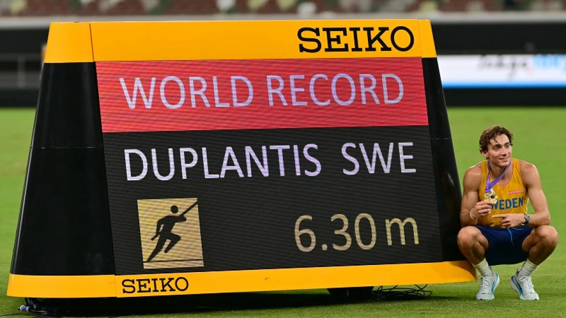 Duplantis soars to new pole vault record and retains world title