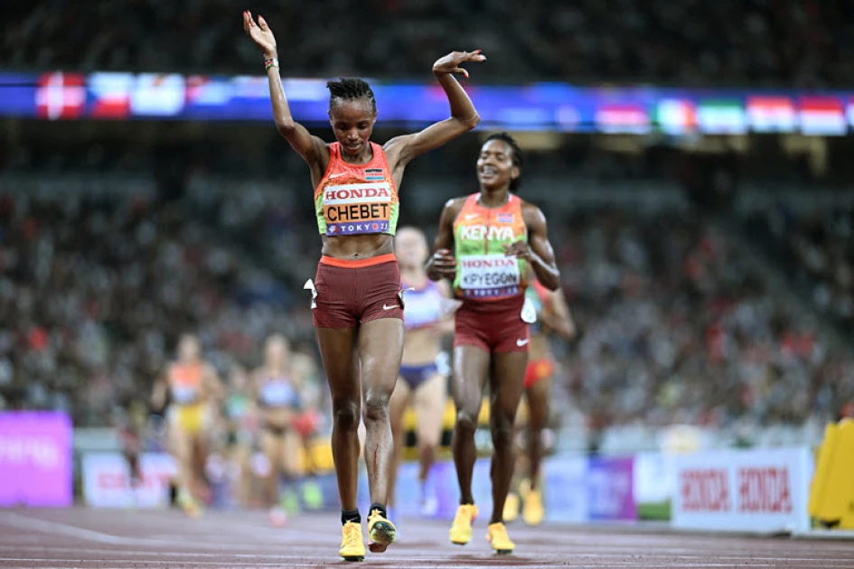 Chebet outsprints Kipyegon to win 5,000m for world double as Kenya takes 1-2 Chebet outsprints Kipyegon to win 5,000m for world double as Kenya takes 1-2