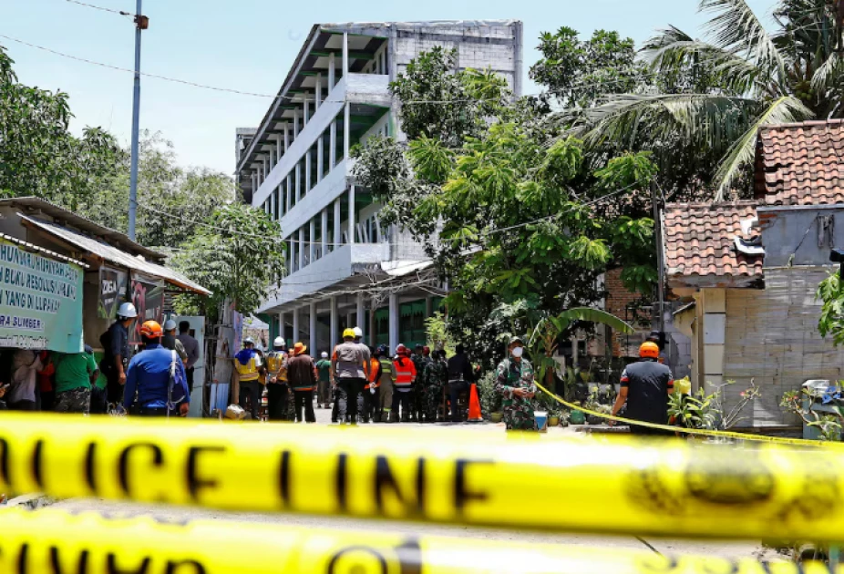 At least 50 bodies recovered after Indonesian school collapse, 13 remain missing