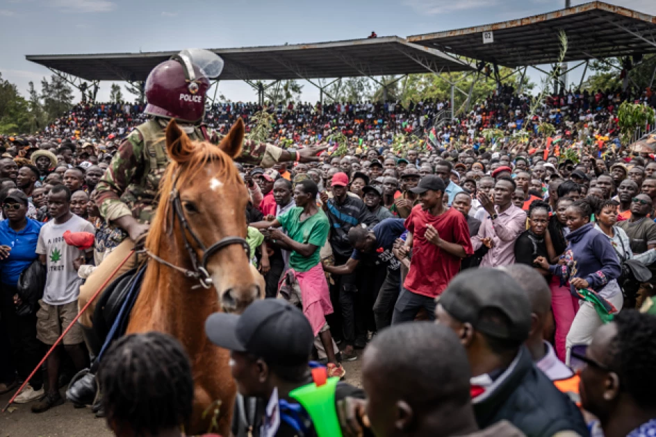 DCI search for mourner who snatched gun from Governor's guard at Raila's funeral DCI search for mourner who snatched gun from Governor's guard at Raila's funeral