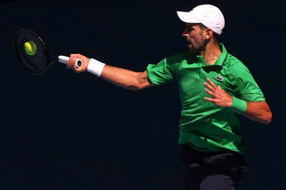 Djokovic rolls into Melbourne third round, Keys defence alive