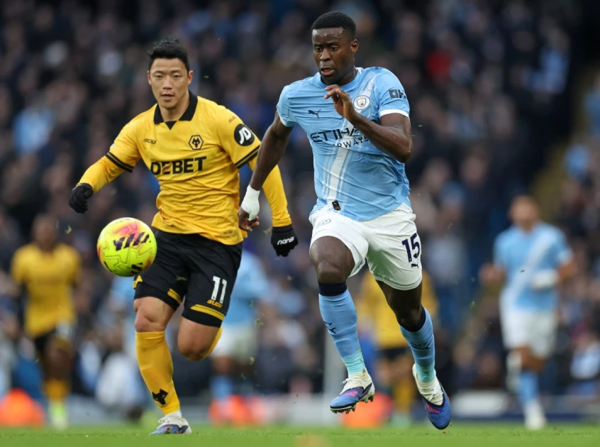 Man City cut gap to league leaders Arsenal to four points