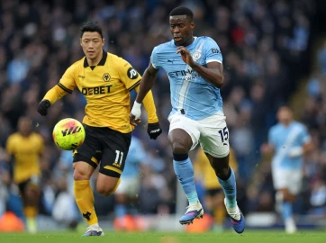 Man City cut gap to league leaders Arsenal to four points