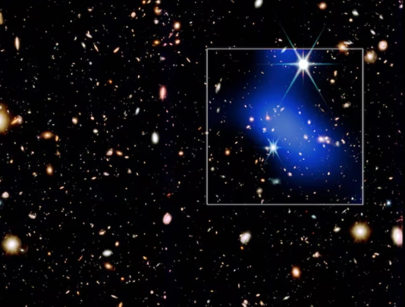 Galaxy cluster observed forming surprisingly early in universe's history