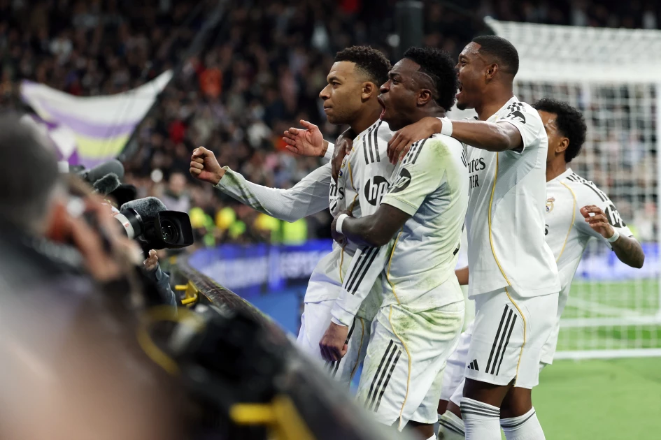 Mbappe penalty earns Real Madrid late win over nine-man Rayo