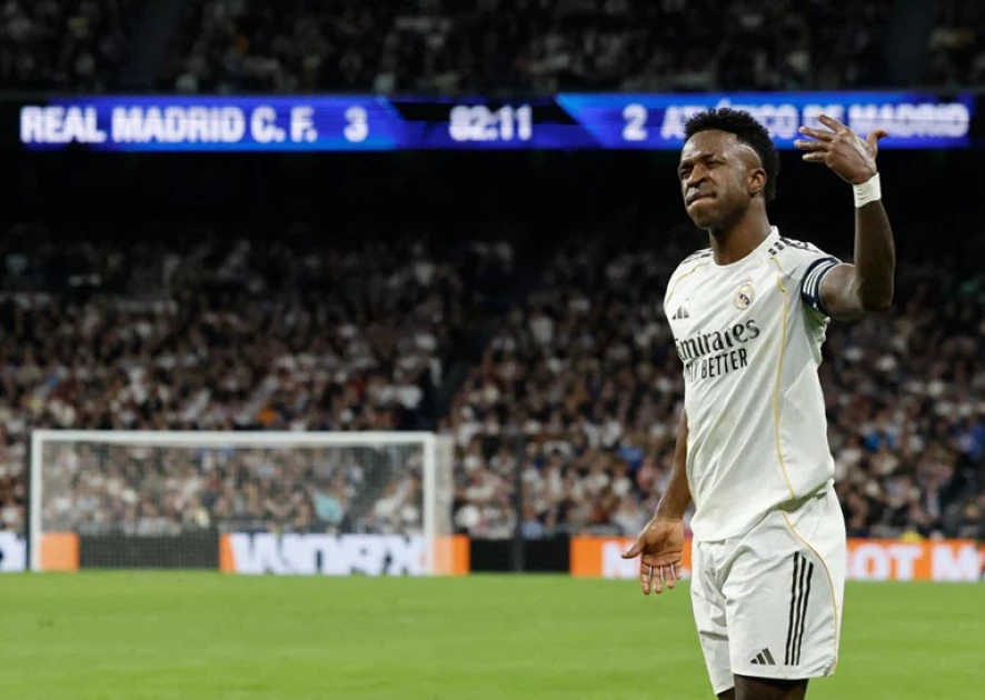 Vinicius double helps Real Madrid edge Atletico thriller