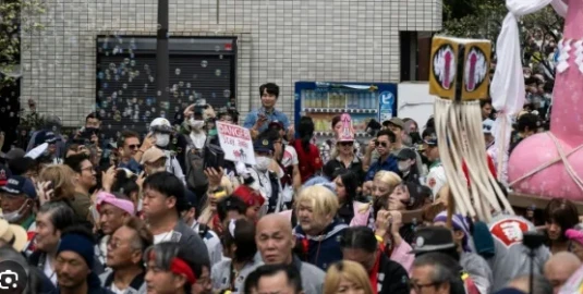 Revellers parade giant penises to dash stigma in Japan's fertility festival