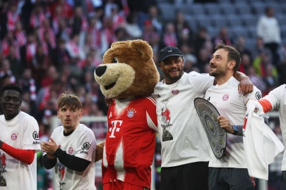 Treble-chasing Bayern put beer showers on ice despite title win