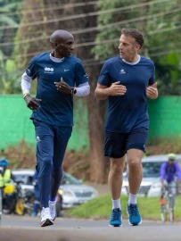 Easy-going French President Emmanuel Macron breaks protocol, dares Kipchoge to a morning jog