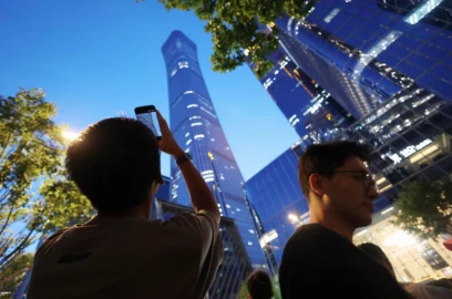 Small aircraft crashes into Beijing's tallest building