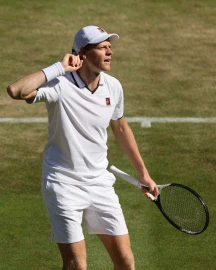 Title rivals Djokovic and Sinner advance at Wimbledon