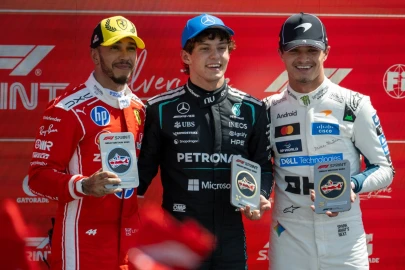 Antonelli edges Hamilton in sprint to extend title lead
