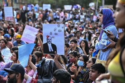 India activists demand release of detained 'cockroach' protesters