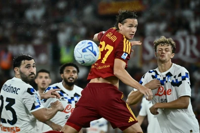 Inter and Roma roar back to win thrillers and share top spot