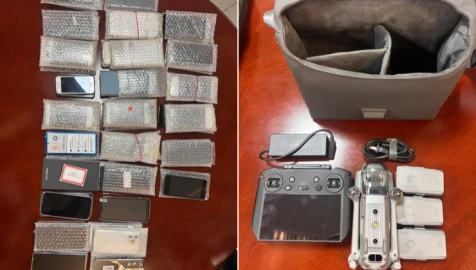 JKIA cleaner arrested carrying bags containing 52 phones, three drones
