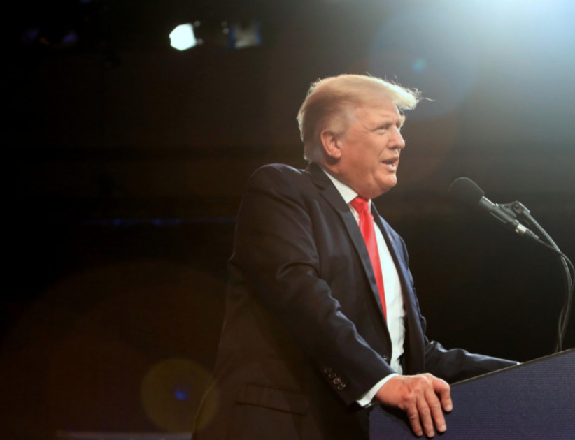 Trump met with boos after revealing he received Covid-19 booster